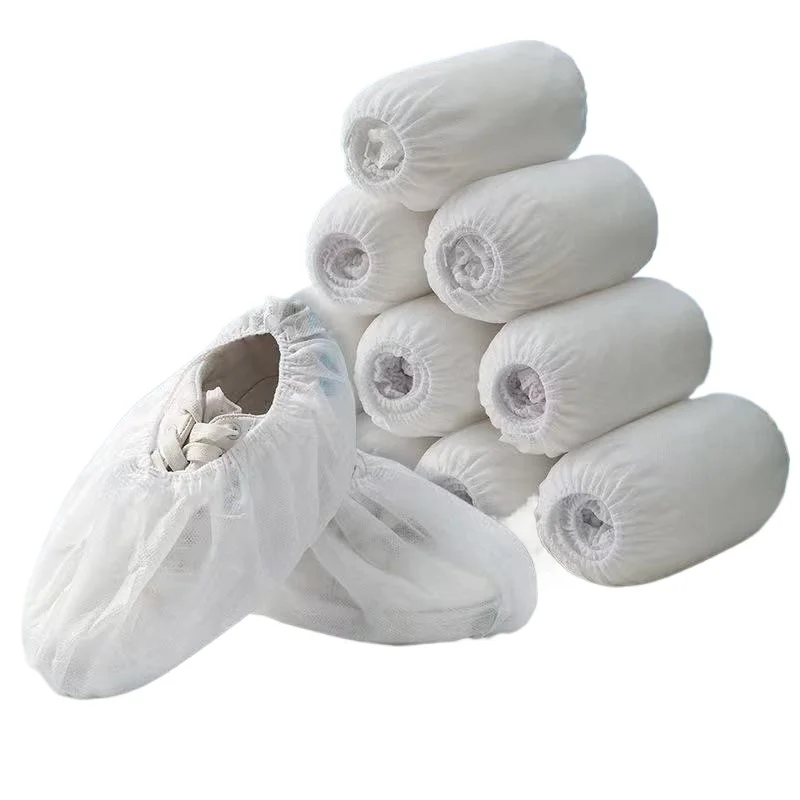 【セール中】100 個使い捨て靴カバーノンスリップフットブーツブーティカバーオーバーシューズ不織布フットプロテクター床屋内靴ホーム