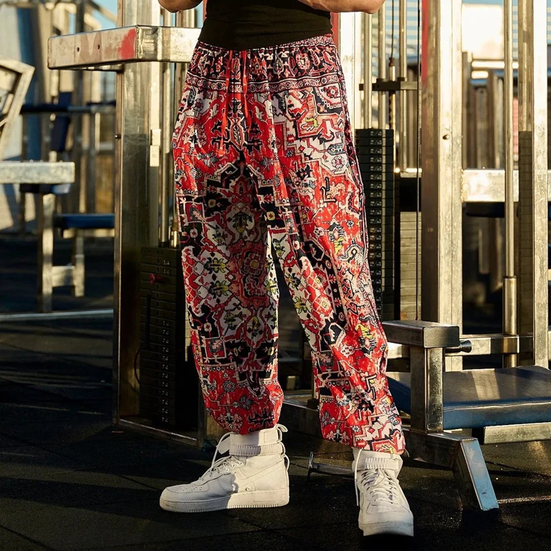 النمط الأمريكي الرجال Sweatpants أزياء الرجال الملابس الصيف تنفس التجفيف السريع فضفاض اللياقة البدنية عارضة السراويل المطبوعة الرقمية