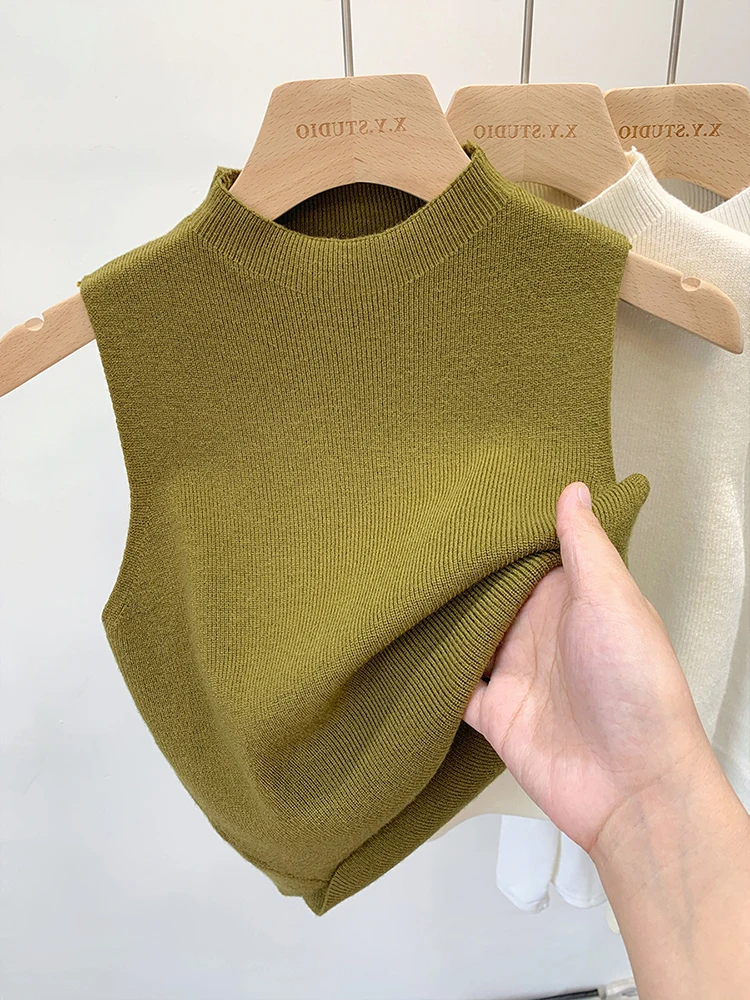 

Женский вязаный жилет с воротником-стойкой без рукавов для весны, лета, осени, зимы, для ношения как под одеждой, так и как самостоятельный элемент гардероба, для делового и повседневного стиля