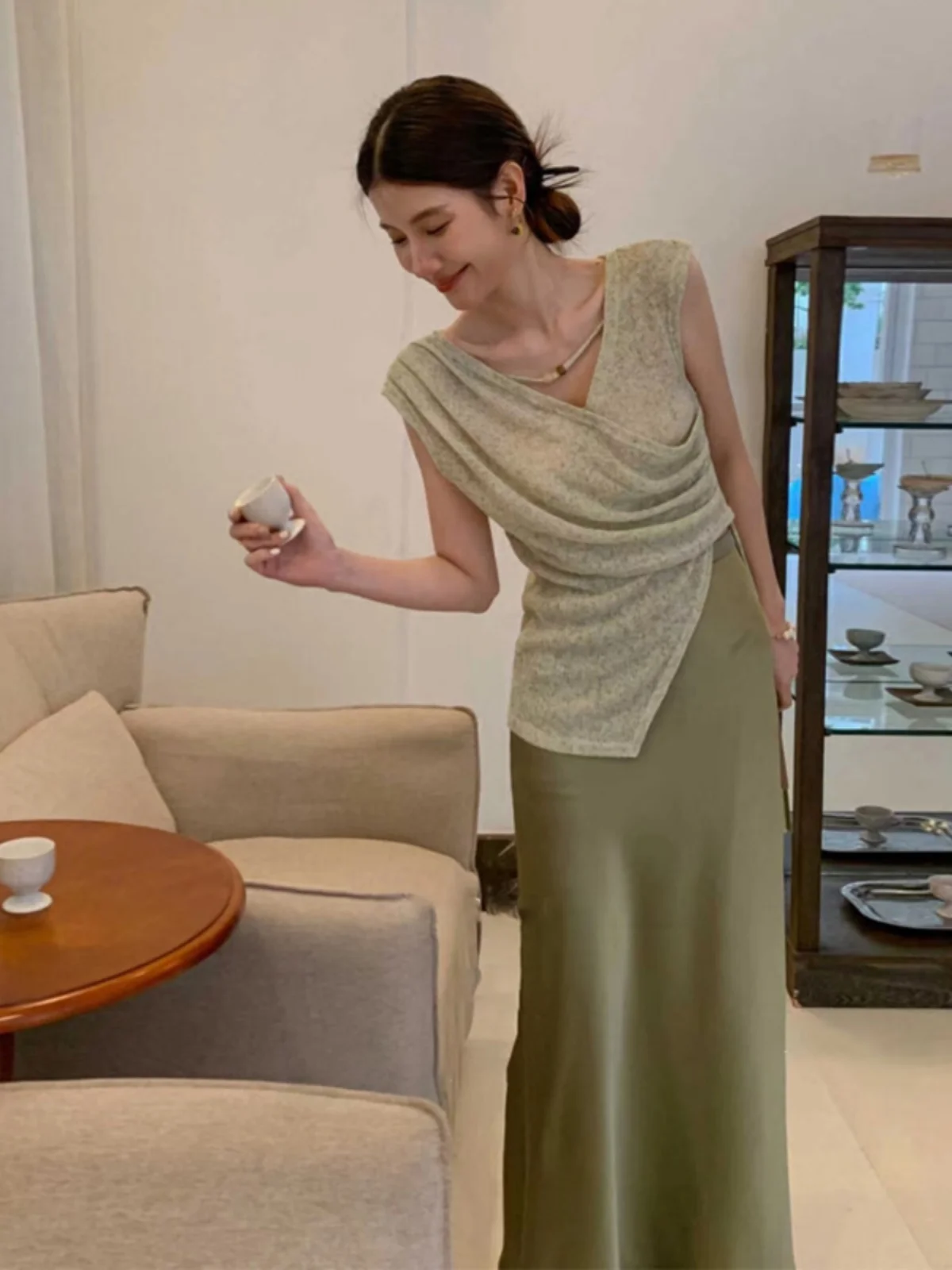 

High Waist Knitted Half Skirt And Sleeveless Cross Design Women's Fashion Set Summer 2025 V-Neck Overhead Casual Wear