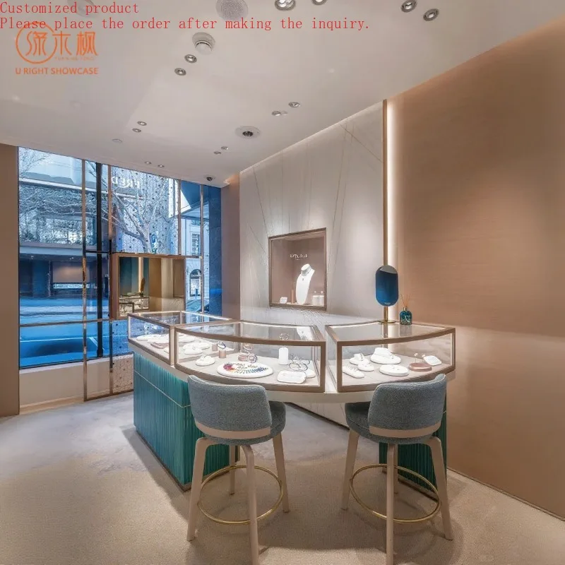 

Custom.Custom Luxury Curved Glass Jewelry Display Cabinet Metal and Wood Base with Seating for High-End Jewelry Boutiques