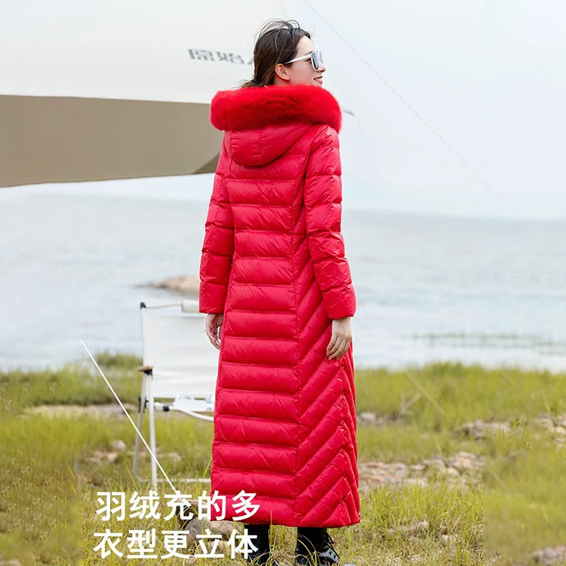 High-end Design Sense Niche White Eiderdown Down  Female 2023 New Long Pure White Big Fur Collar Hooded Warm Thick Coat.