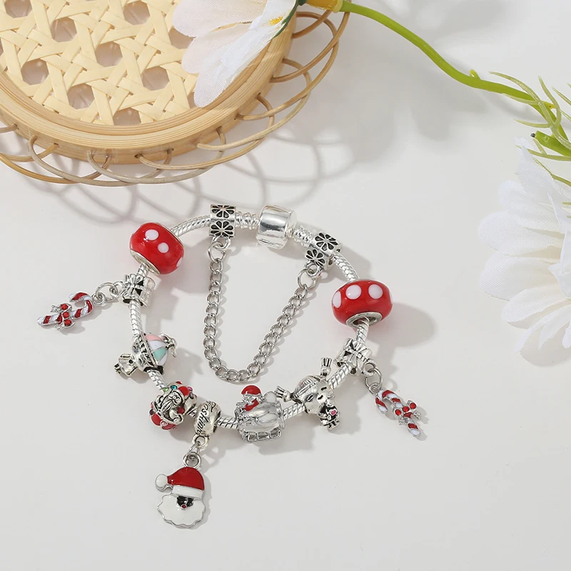 Hot selling silver Santa Claus staff pendant bracelet, paired with a red Murano glass bead bracelet, suitable for ladies and