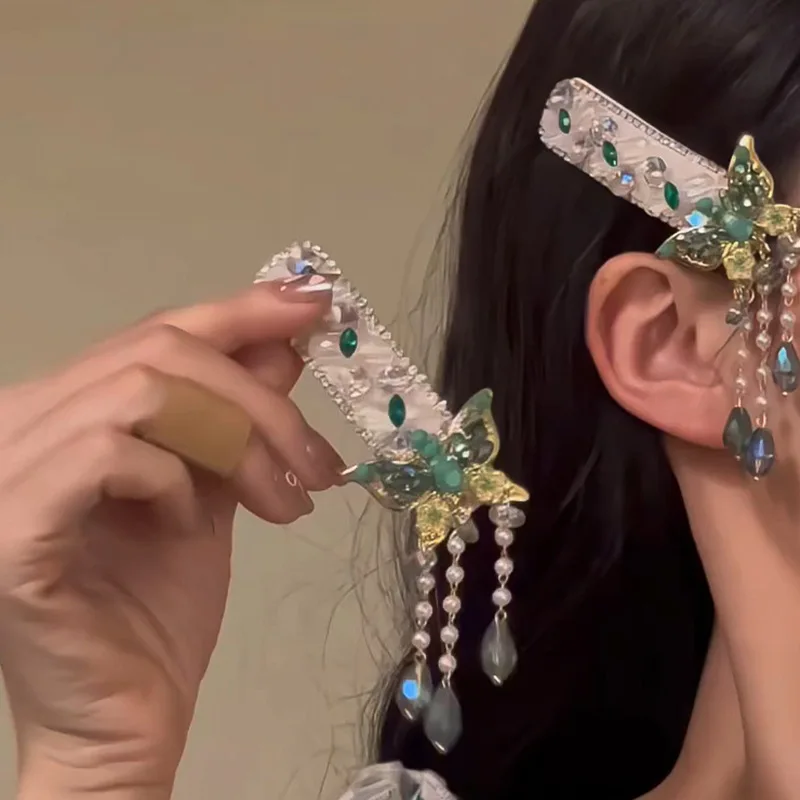

New Chinese style green butterfly tassel hair clip, ethnic style, forest style, small and fresh bangs, side headpiece for women