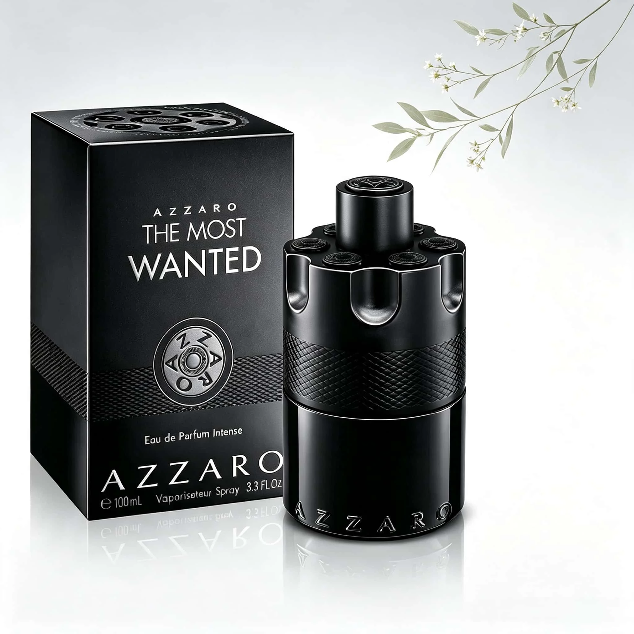 Azzaro The Most Wanted Eau de Parfum Intense für Männer 100ml Mattschwarze Flasche in Pistolenform Strukturierte Gewebte Verzierung Warmer Holziger Würziger Duft Luxuriöses Maskulines Parfüm
