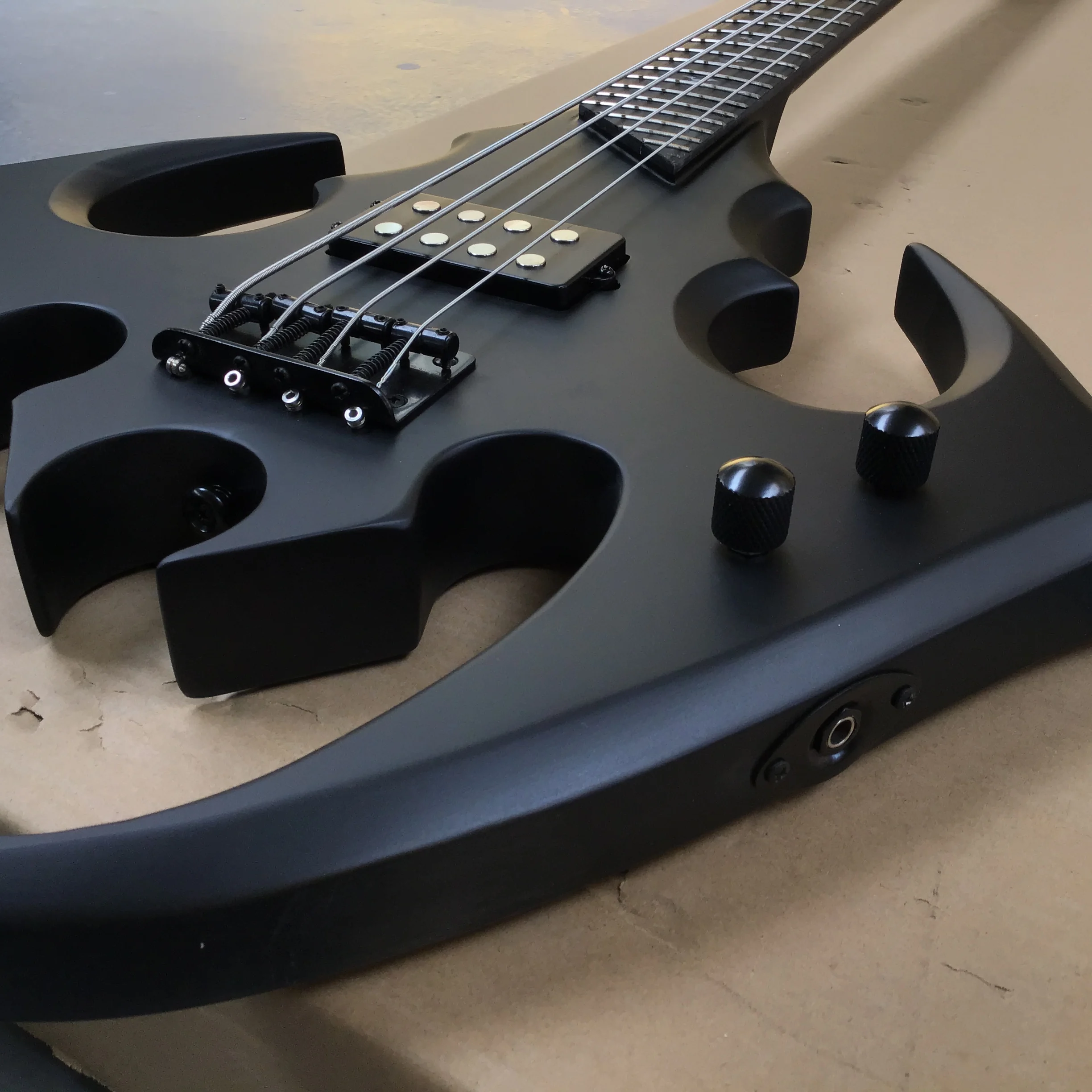 hot sales irregularity Bat shape 4-string electric  bass guitar, perfect tone black hardware hot sale in stock customizable