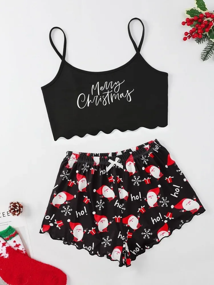طقم بيجامة نسائي مطبوع عليه سانتا لعيد الميلاد مع حزام سباغيتي وسروال قصير برقبة دائرية بدون أكمام