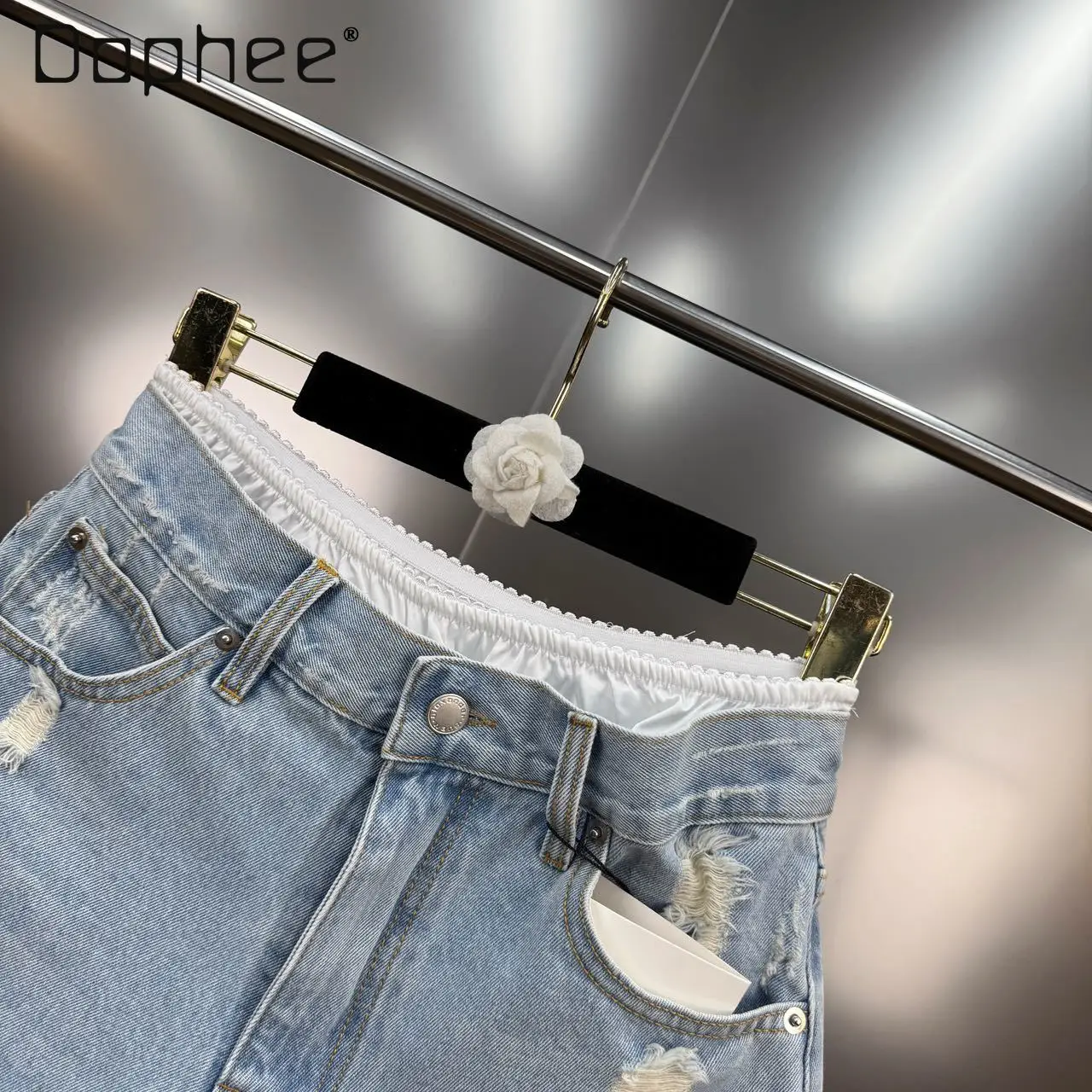 Estate 2025 Nuovo francese retrò pizzo splicing strappato bordo grezzo falso pantaloncini di jeans in due pezzi Spice Girl Y2K jeans slim a vita alta