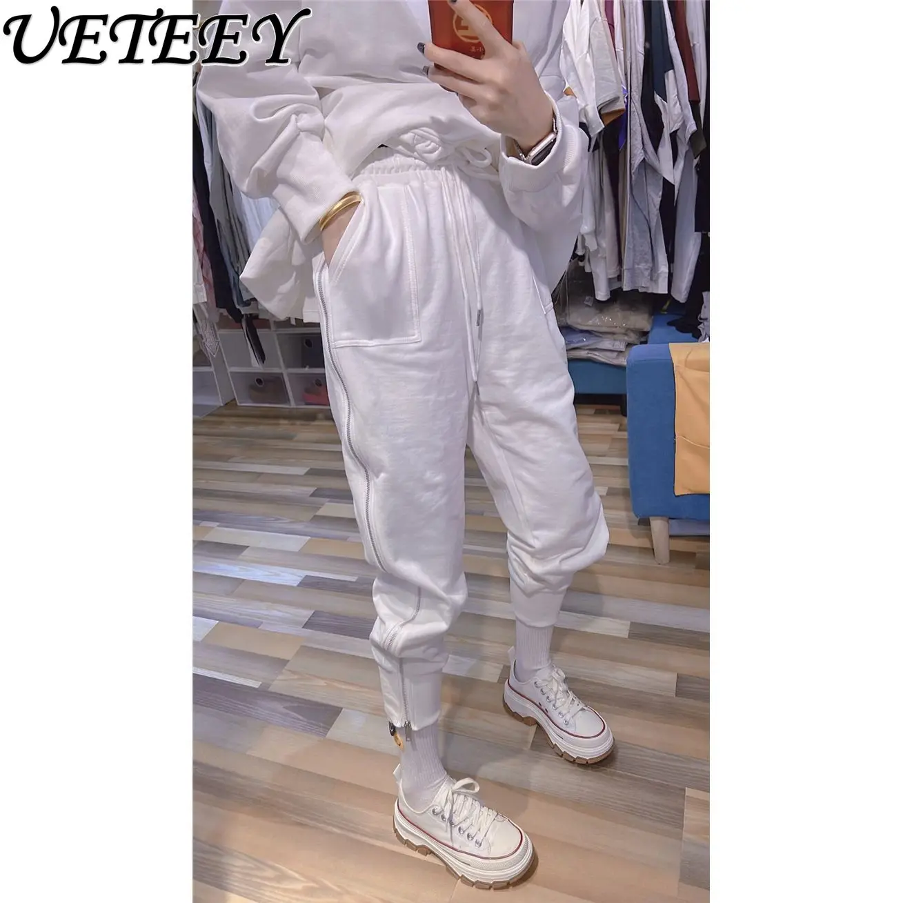 2025 ฤดูใบไม้ผลิและฤดูร้อนใหม่ซิปด้านข้างกางเกงขายาวขนาดเล็กผู้หญิงเกาหลีรุ่นสบายๆกางเกงสีขาวหลวมHoodieกางเกงน้ําหญิง