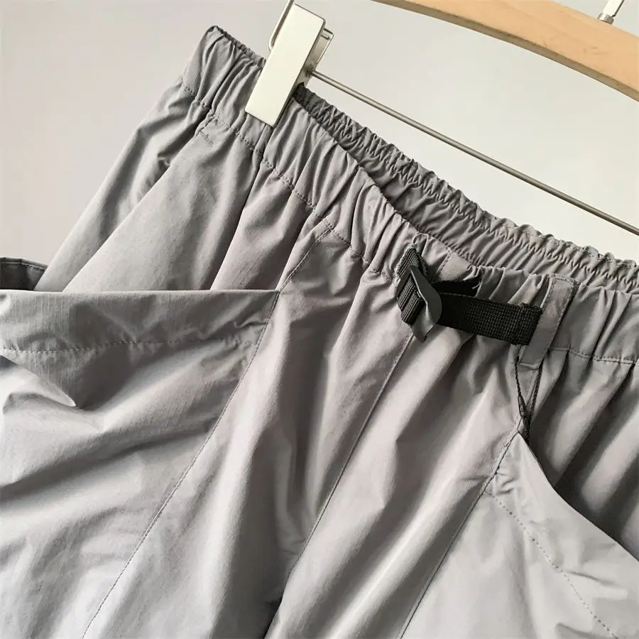 GOLDWIN 26SS Unisex Loose Fit Wasserdichte Ripstop-Shorts mit mehreren Taschen, leichte Techwear für Outdoor-Wanderungen, Gorpcore, knielang – Detail 9