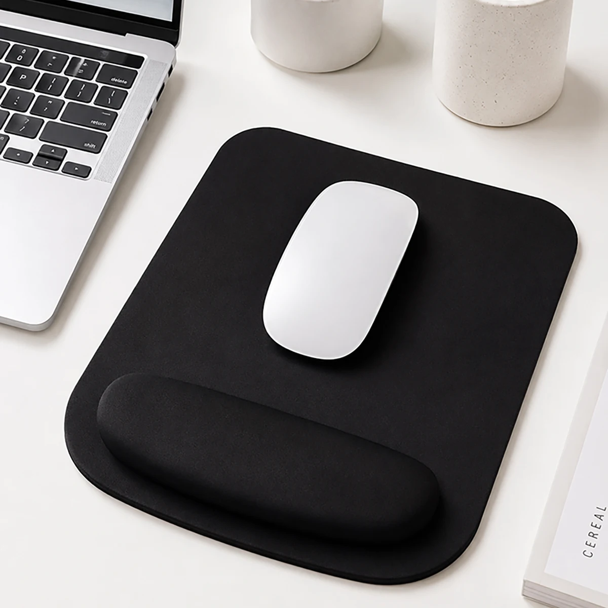 1/3 of a comfortable, thickened, non-slip wrist rest mouse pad made of silicone, designed for office use, with wrist support and 3D effect