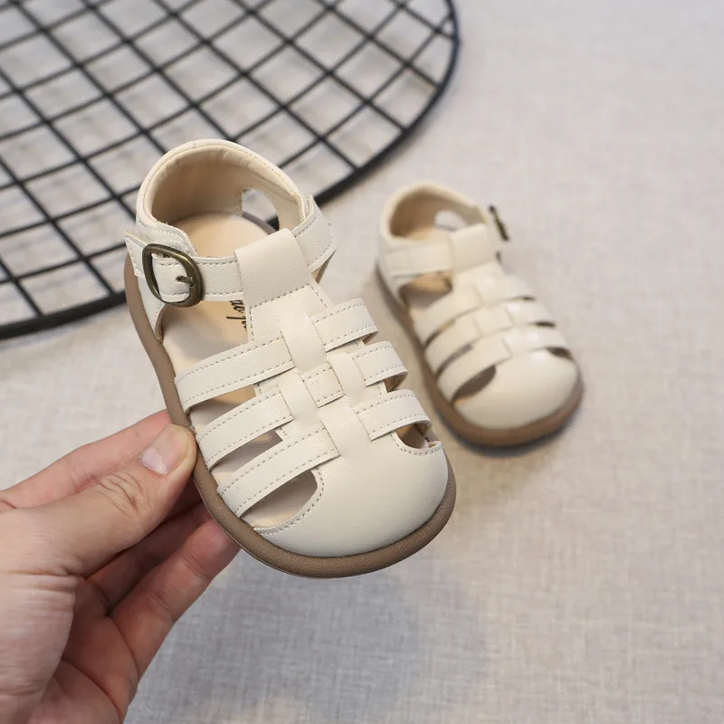 Sandalias Baotou para niños y niñas, zapatos romanos de Velcro, cómodos, tejidos, huecos, novedad de verano, 2024