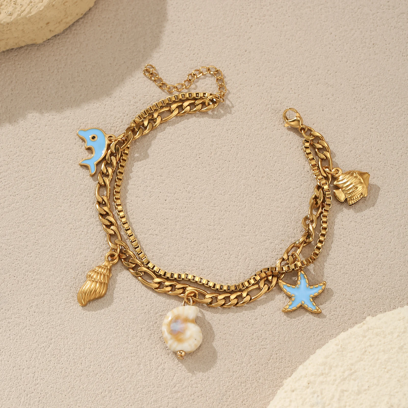 Golden Tone Stainless Steel Ocean Charm Bracelet with Dolphin Starfish and Shell Pendants for Women