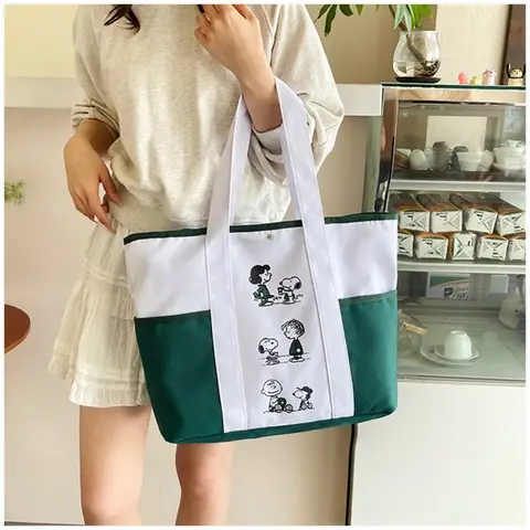 MINISO Ny tecknad söt Snoopy stor kapacitet tryckt casual canvasväska fräsch pendlarväska student enaxlad handväska 12 best sales Snoopy Zara - №7