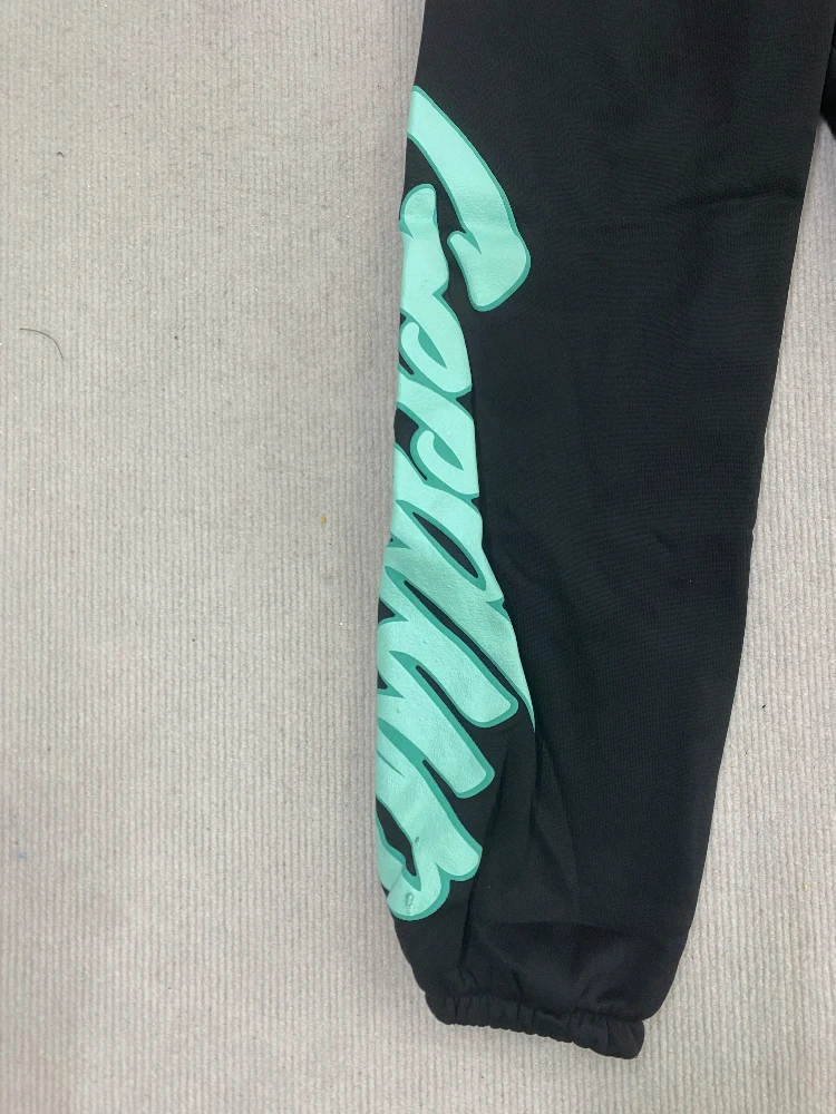 กางเกงแฟชั่นฮิปฮอปสไตล์ฮาราจูกุเรียบง่ายแนวสตรีทยุค 2000 สปอร์ต สร้างสรรค์ พิมพ์ลายตัวอักษรเฉพาะตัว สไตล์ลำลอง สำหรับฤดูใบไม้ร่วงและฤดูหนาว