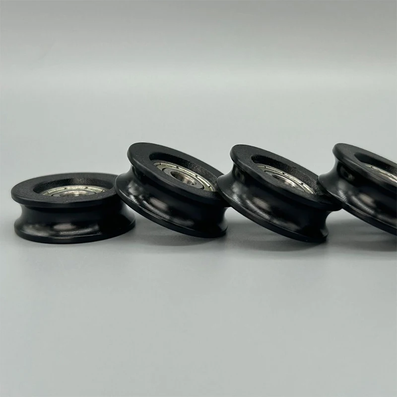 U-الأخدود النايلون بكرة مستديرة الكرة تحمل عجلات تستخدم ل نافذة الباب دش بكرة درج انزلاق الباب قطر 23-43 مللي متر