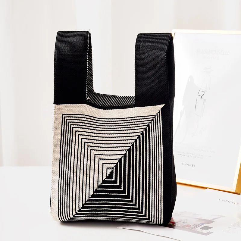 Borsa in bianco e nero minimalista intrecciata a mano morbida mucca pois Casual elegante stile francese piccola moda donna Tote Polyster