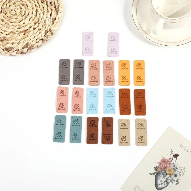 30Pcs 2x5cm Handmade PU Leather Tags with Wool Ball Sew on Labels Embellishment Knitting for DIY Crafts Sewing Labels