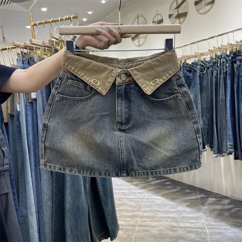 Color Blocking Denim Skirt for Women Retro High Waisted Blue Hip Hugging Short Skirt 2026 New Summer Anti Glare Half Dress