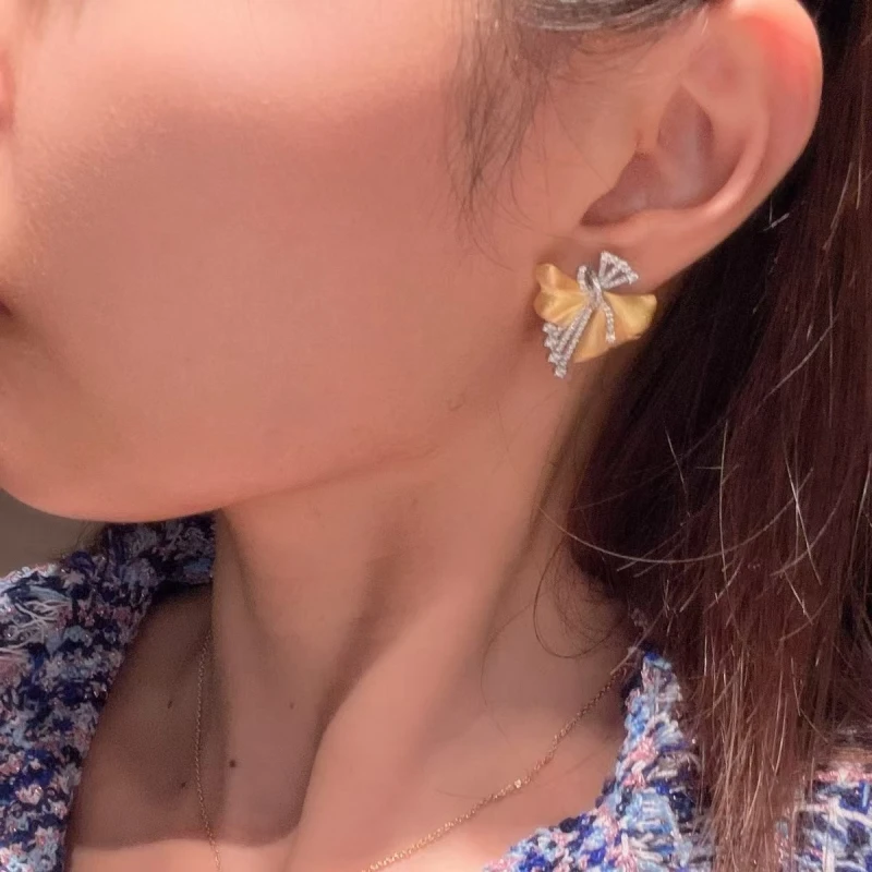 Europe and the United States hot vintage high-grade brushed bow micro-stud earrings ladies delicate fashion holiday gift