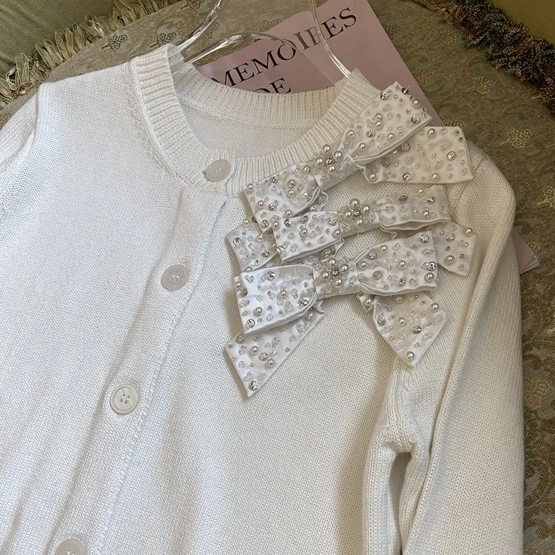 2025 خريف جديد رقيقة مطرزة مطرز القوس سترة متماسكة موضة الجولة الرقبة طويلة الأكمام معطف قصير #3