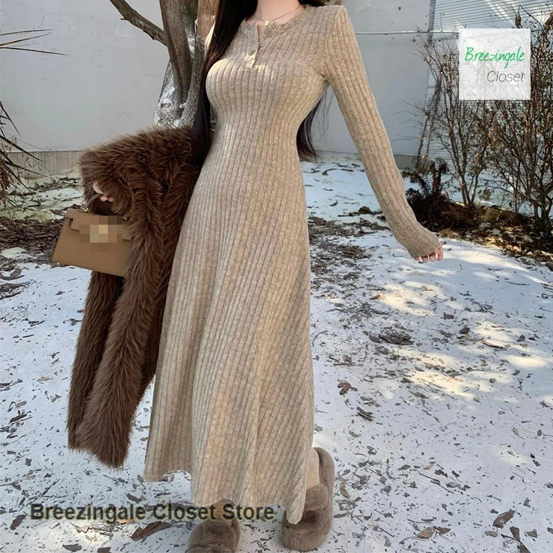 

French temperament long-sleeved knit dress women's autumn and winter new bottoming with fashion design and waist-length skirt.