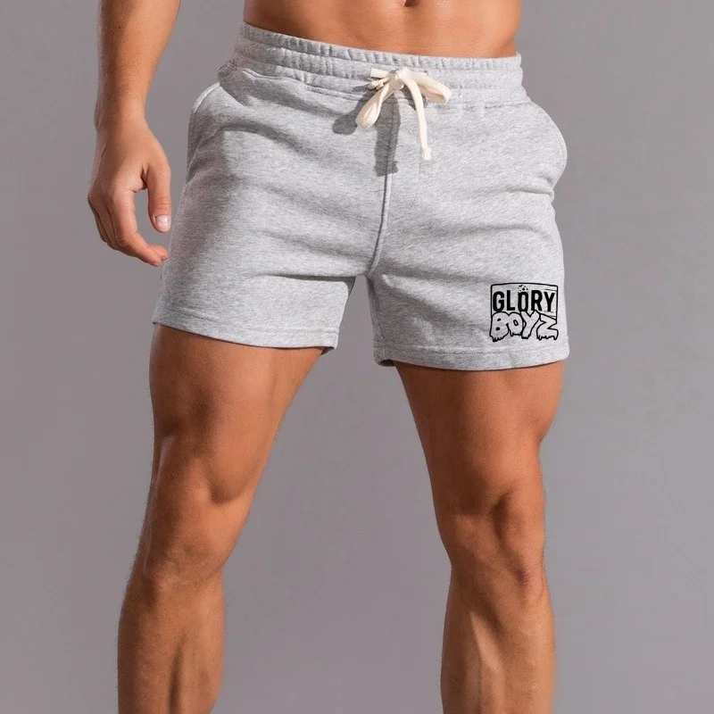 صيف 2024 جديد أزياء الرجال في الهواء الطلق تصميم غير رسمي السراويل الأمريكية جيوب جانبية اللياقة البدنية تشغيل الركض 3 نقاط تكنو بليد تجريب