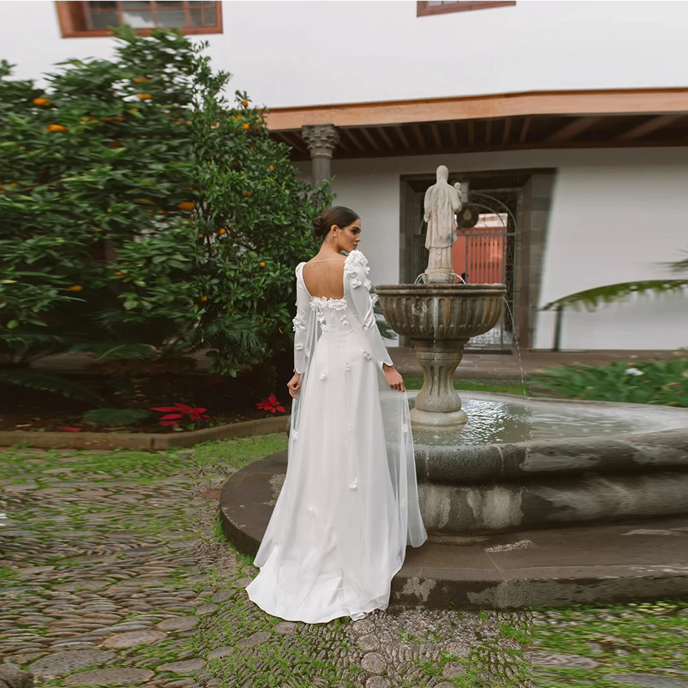 فساتين زفاف نسائية مخصصة موديل 2025 برقبة مربعة وأكمام طويلة أنيقة من الساتان فساتين العروس بطول التطهير رداء الولائم