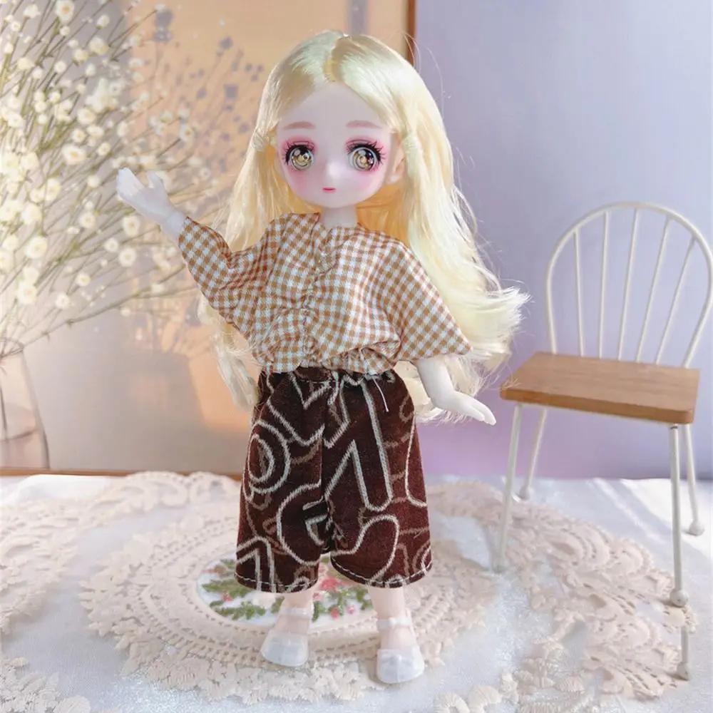 

Кукла-одевалка с одеждой Кукла BJD 3D Глаза Одевание Имитация глазной петли Кукла Красочная 23 см Съемные суставы Кукла Подарок на день рождения