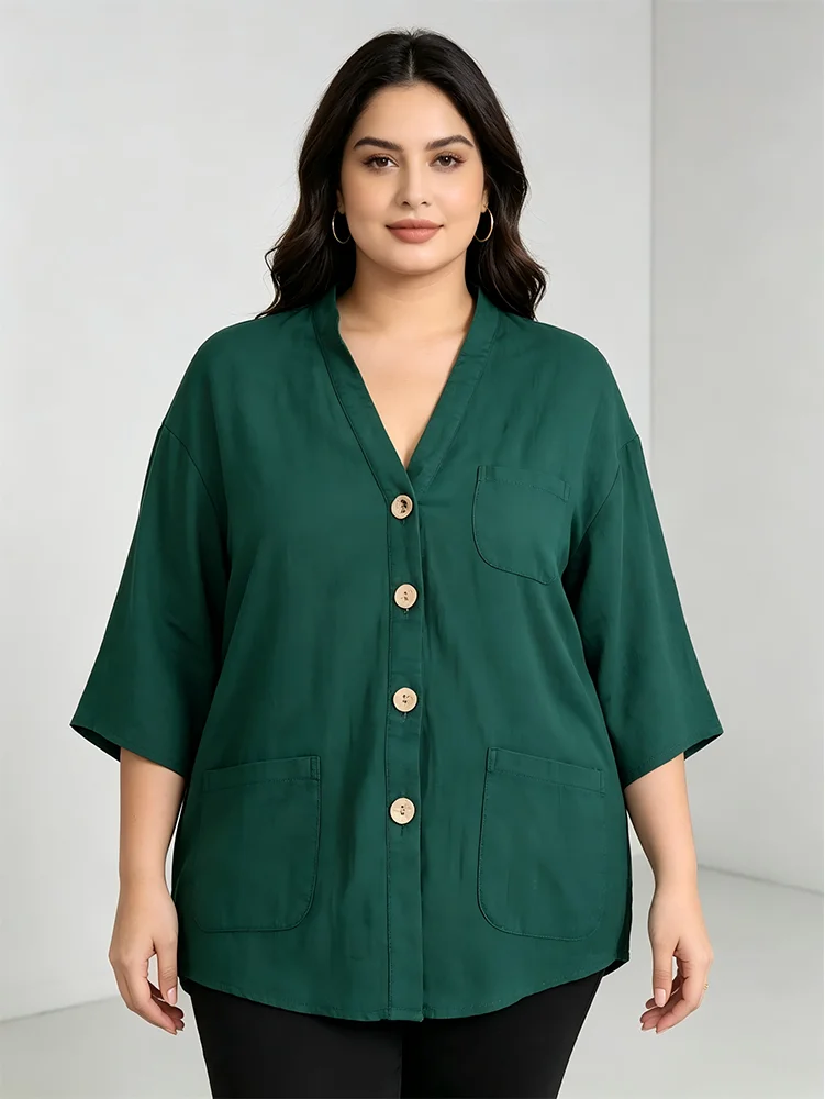 Plus Size Green Linen Blouse for Curvy Women. V-neck half sleeve button shirt with multi pockets. Oversized loose fit perfectly