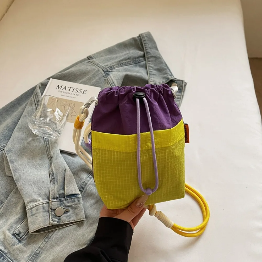 

Shoulder Strap Small Drawstring Bucket Bag Nylon Front Pocket Water Bottle Holder Quick Drying Drawstring Open To