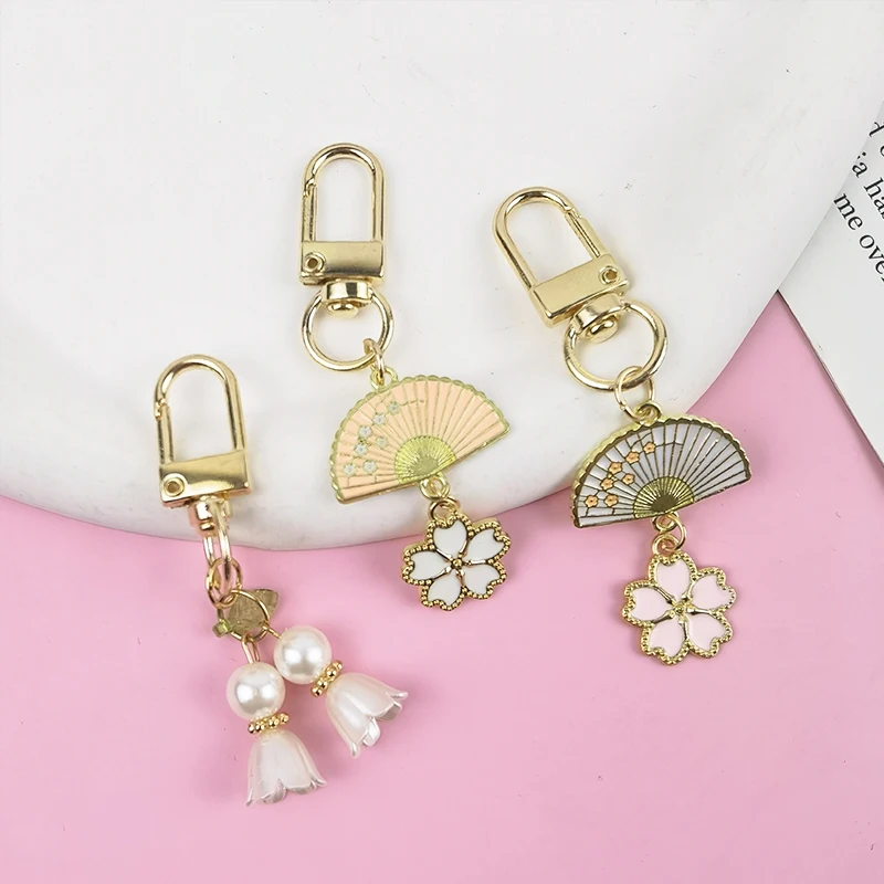 Elegant Pink Lily Of The Valley Keychain Fashion Fan Flower Pendant Key Ring Earphone Case Holder Wallet Charm Key Accessories