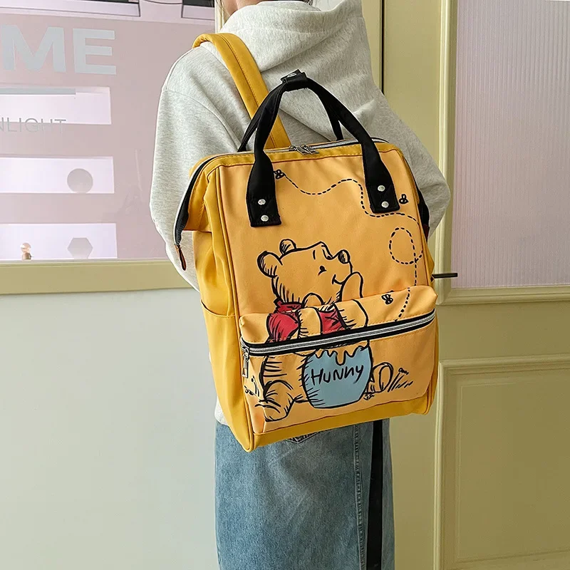 

Disney cartoon Pooh Backpack Capacity Mommy Bag Kids Bag Schoolbag Gift