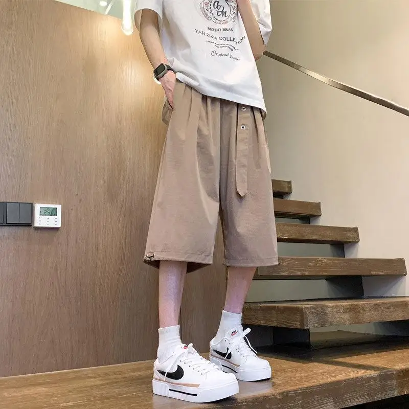 男性夏のハイストリートベルトカジュアルルーズソリッドカラー多用途ポケットスプライシングワイドレッグパンツ