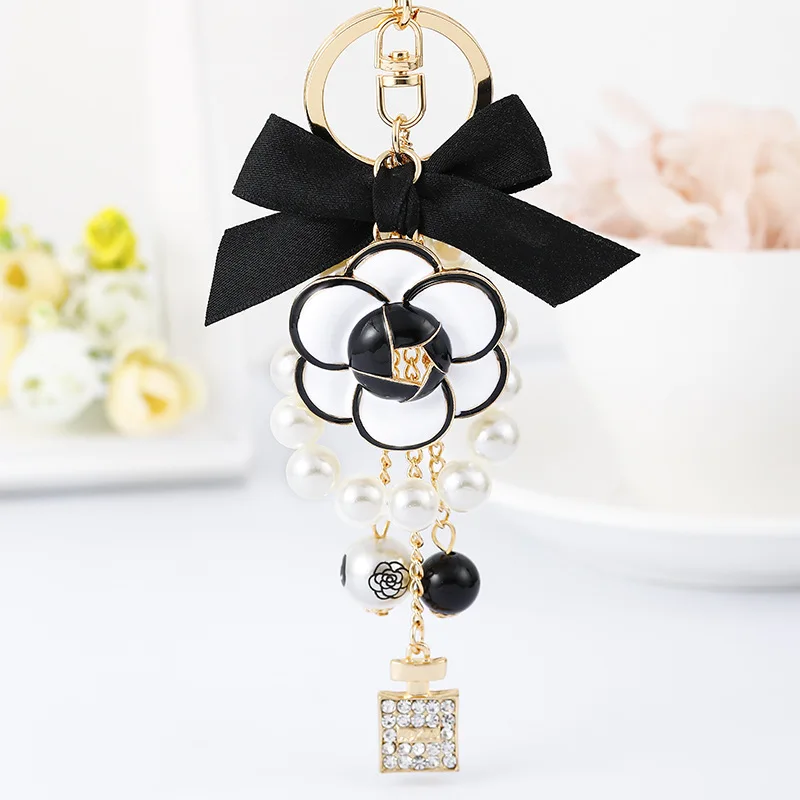 Luxury Pearl Oil Camellia Bow Tie Car Key Chains Women Bag Handbag Pendants Bottle Keychain Gift Jewelry