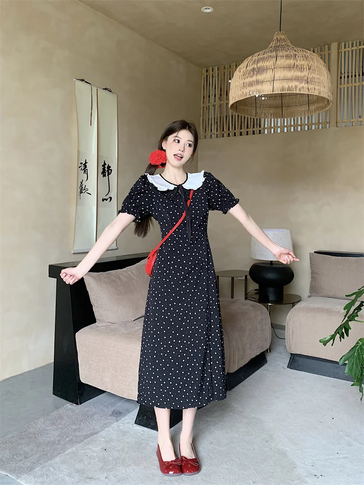 2025 novedad de verano estilo francés de gama alta de manga corta vestido con cuello de muñeca diseño suave único negro dulce vestido de vacaciones bata femenina