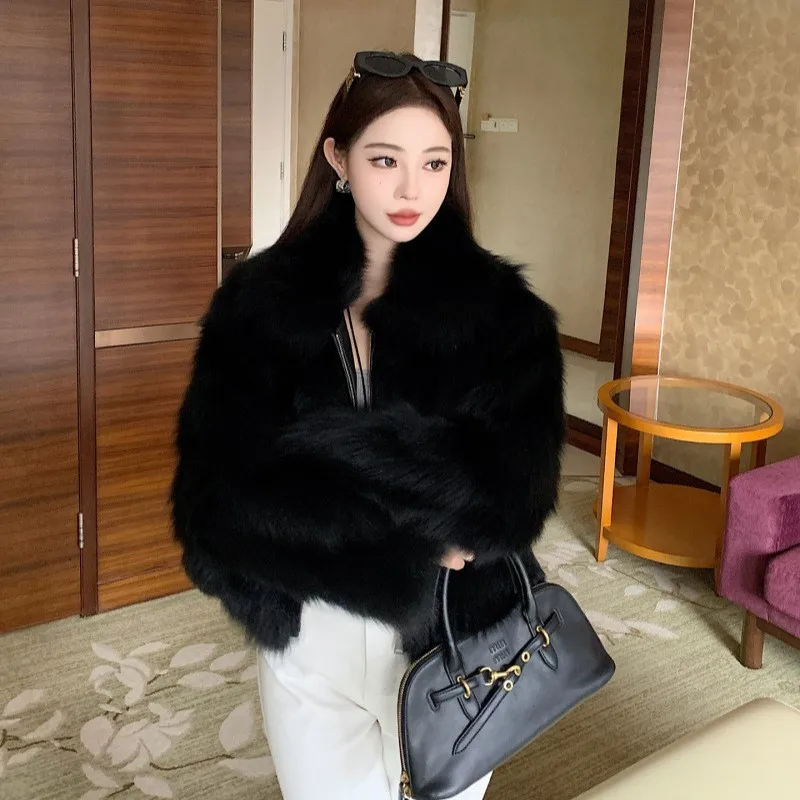 

A light warm thick and short fur coat made of artificial mixed