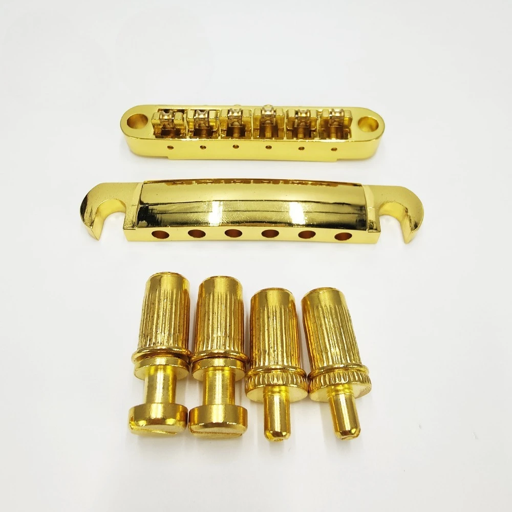 

Полный комплект роликовых мостов с шарикоподшипником, включает роликовые седла и хвостовик для электрогитары.