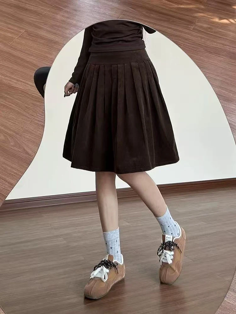 الشتاء خمر سروال قصير تنورة المرأة Y2K عالية الخصر الشارع الشهير الدافئة فضفاض مطوي تنورة السيدات الكورية كل مباراة طول الركبة تنورة