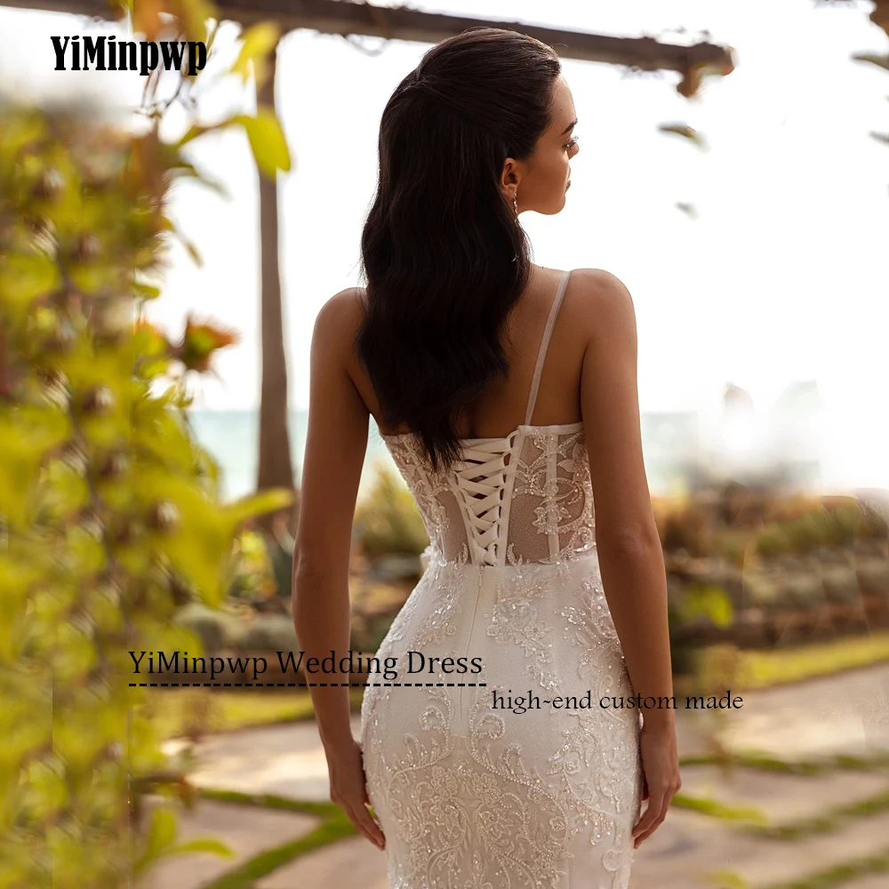 신부를위한 현대 웨딩 드레스 인어 백리스 코르셋 스팽글 아플리케 스파게티 스트랩 스파클링 로브 드 마리에 맞춤형