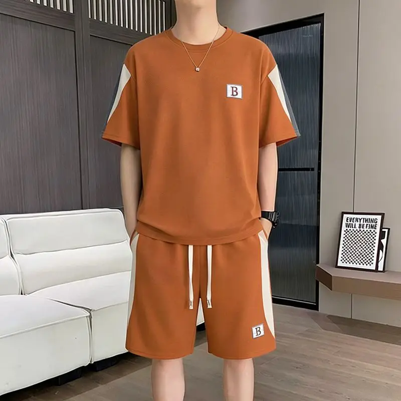 

Men's Summer Casual Set 2026 New Splicing T-Shirt Shorts Two Piece Outfit Loose Fit Streetwear with Embroidery Detail