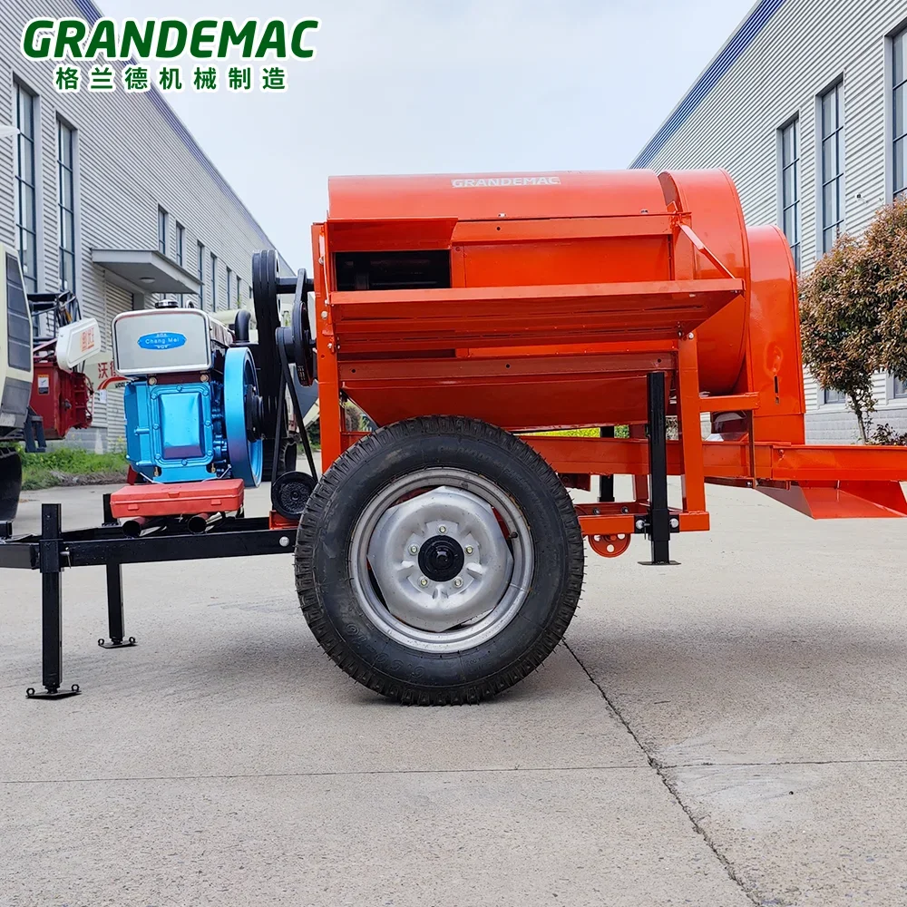 Small threshing machine with tyres for threshing rice and wheat