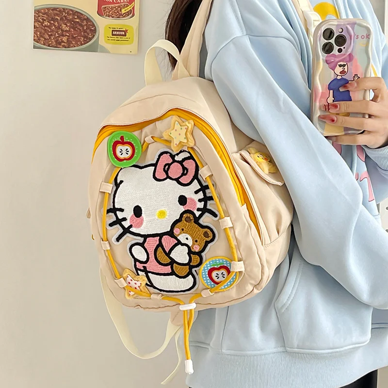 Nueva mochila escolar bonita y dulce de Hello Kitty de Sanrio con estampado de dibujos animados, mochila ligera de viaje de gran capacidad