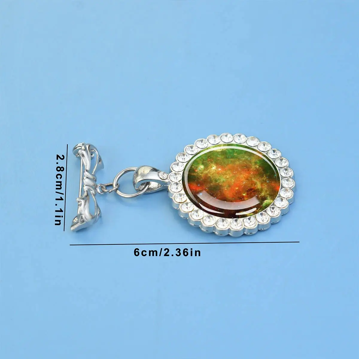 1PC Nebula galaxy themed circular glass brooch with synthetic zircon trim, suitable as a holiday party gift.
