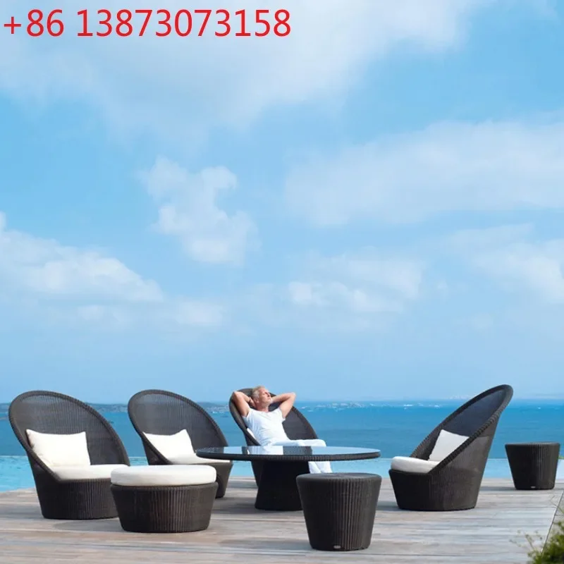 Nordic courtyard high backrest rattan table and chair sofa hotel outdoor leisure rattan chair tea table three-piece combination