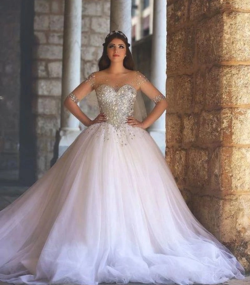 Abiti da sposa A maniche lunghe di lusso arabo Dubai una linea di abiti da sposa con perline trasparenti con scollo tondo per le donne Tulle Vestidos De Novia