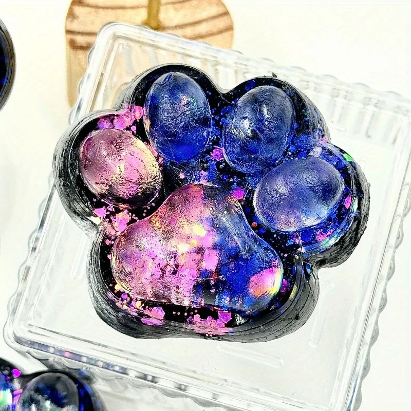 1pc Starry Night Glow Squishy Knijpspeeltje - Zwart Gradiënt Blauw Kat Poot Relax Zacht Speelspeeltje voor 3+ jaar, Perfect 3-jarige Gif