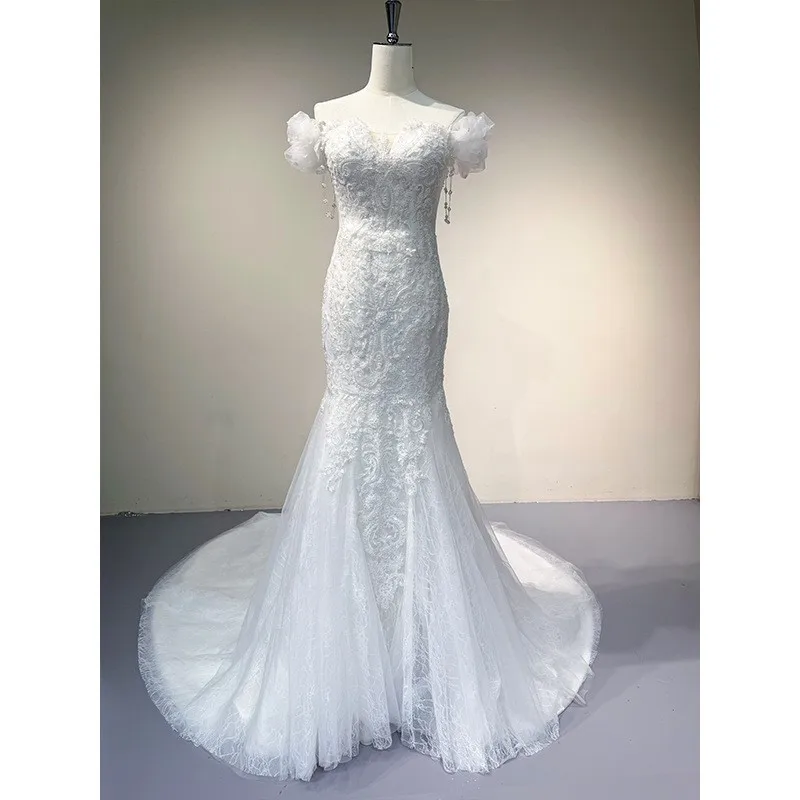 

A new luxurious and heavy-duty fishtail chiffon dress with one-shoulder knot main fabric trailing lace