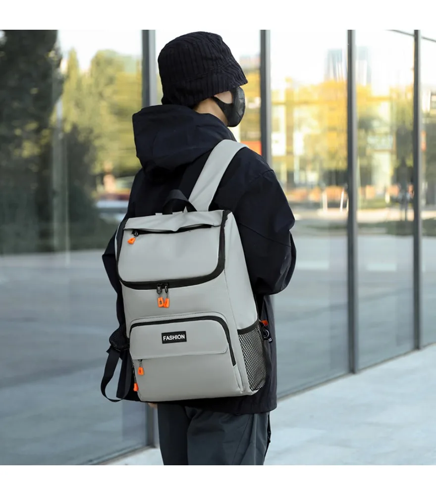 Black flap backpack with orange zipper pulls anti splash front label design for young people daily outdoor use
