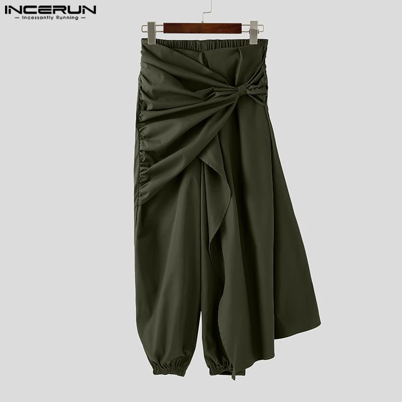 

INCERUN Men Pants Solid Color Elastic Waist Joggers Irregular Pants Pleated Lace Up Loose Streetwear Fashion Casual Trousers Men